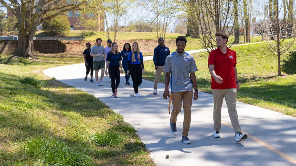 Students walking on a walking track