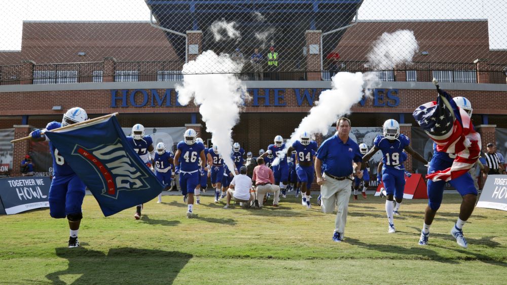 UWG football players entering the field