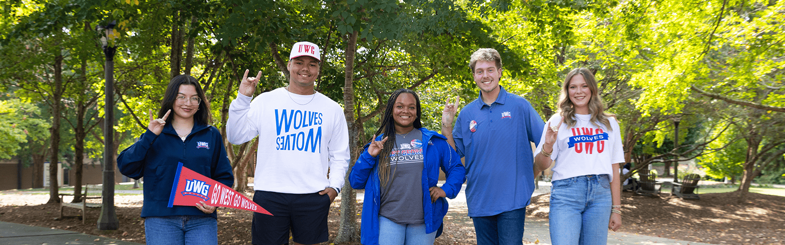Five students pose for photo on UWG's campus