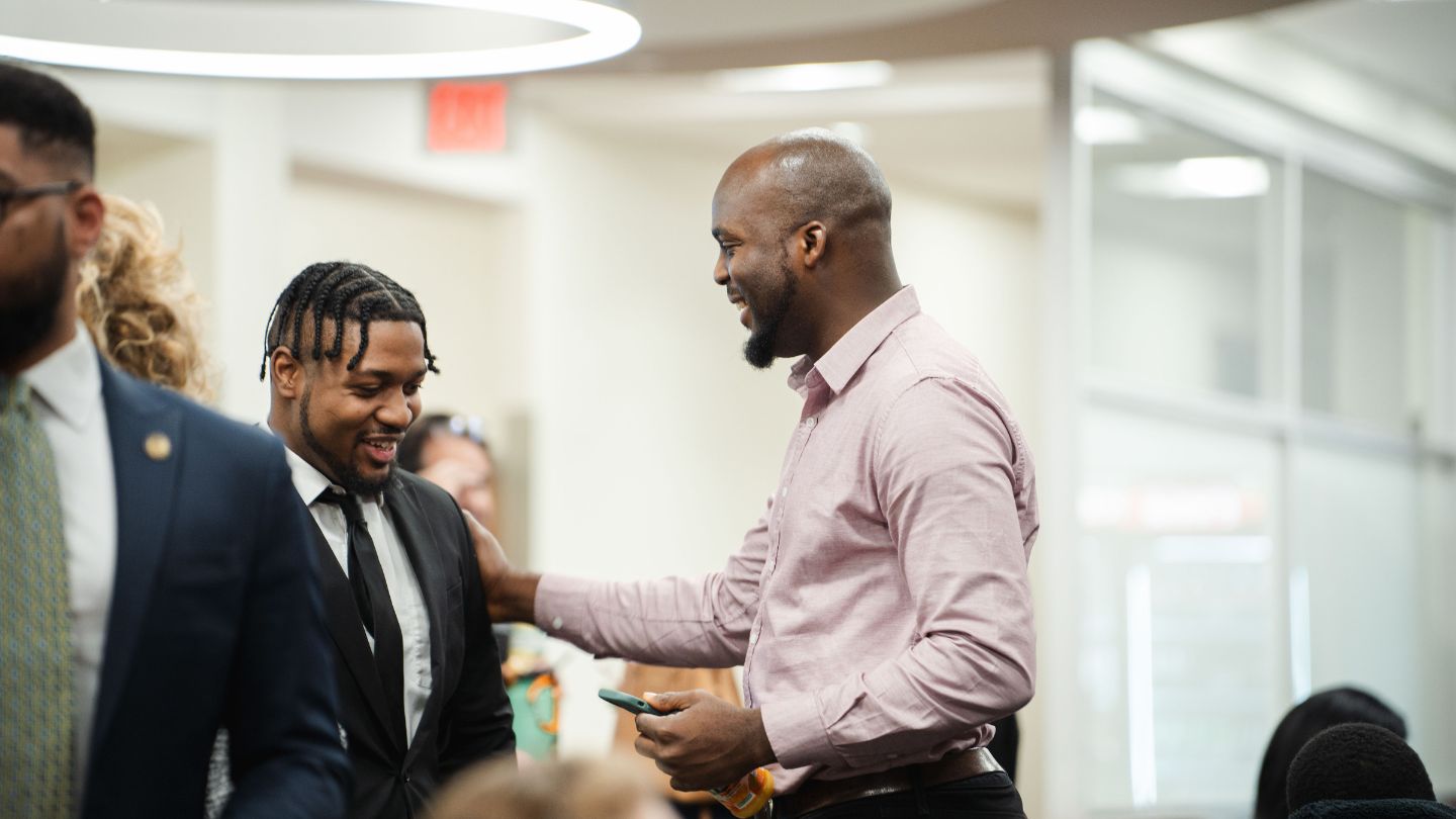 Students studying on the grass