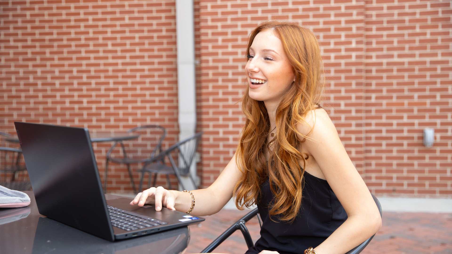 wolfden busines pitch competition winner holding check