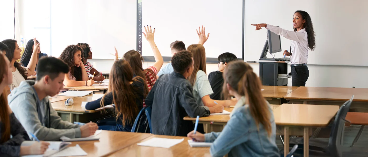 women teaching a high school class