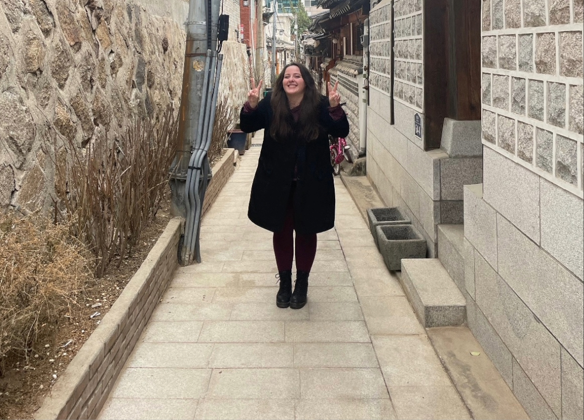 girl standing in alley in south korea street