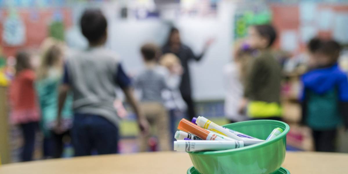 picture of student and teacher celebrating