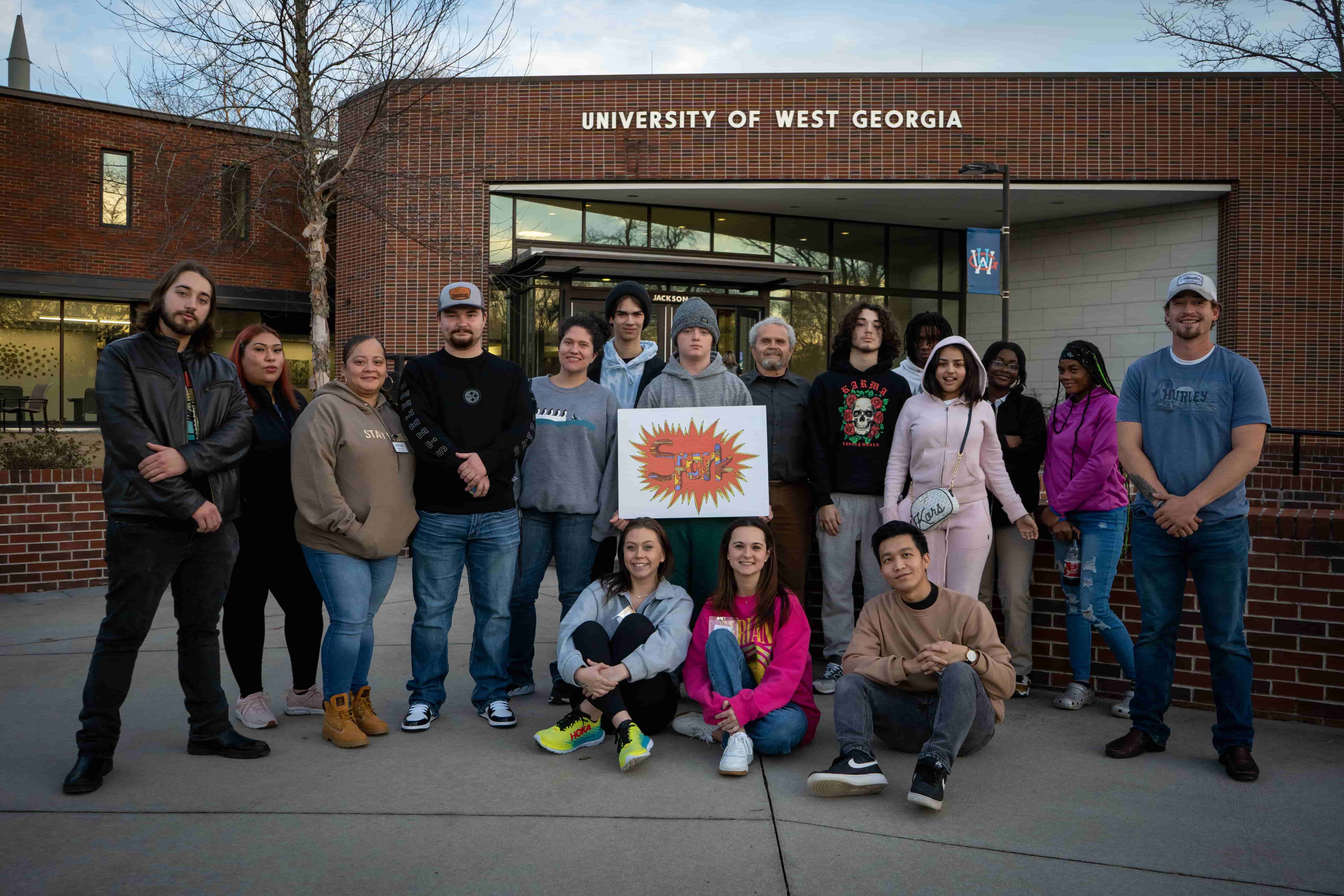 SPARK mentoring group photo outside the Newnan Campus entrance.