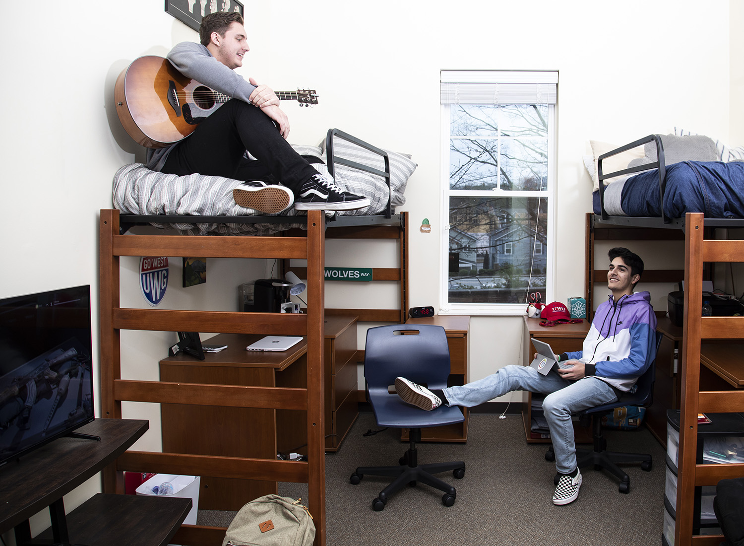 Students in dorm room. 