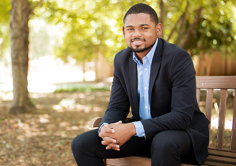 male student on bench