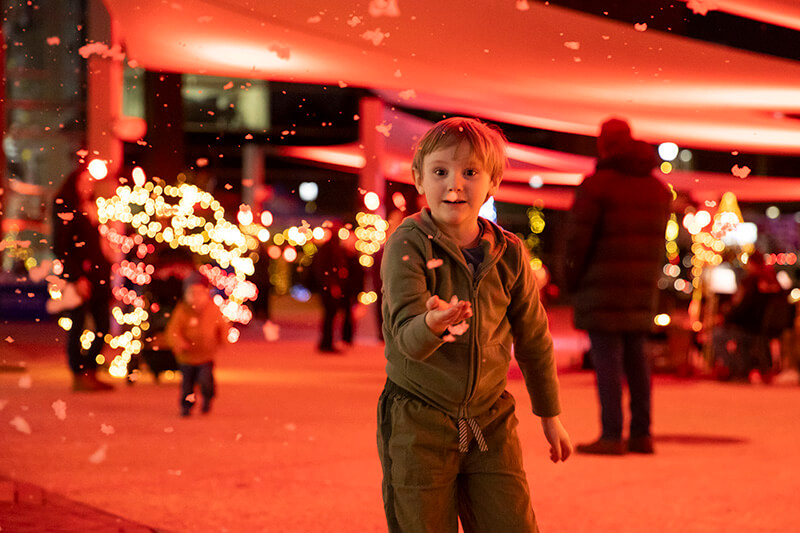 Child playing in the snow