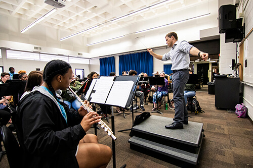 Dr. Josh Byrd directs the UWG Wind Ensemble in playing "Sunshine."