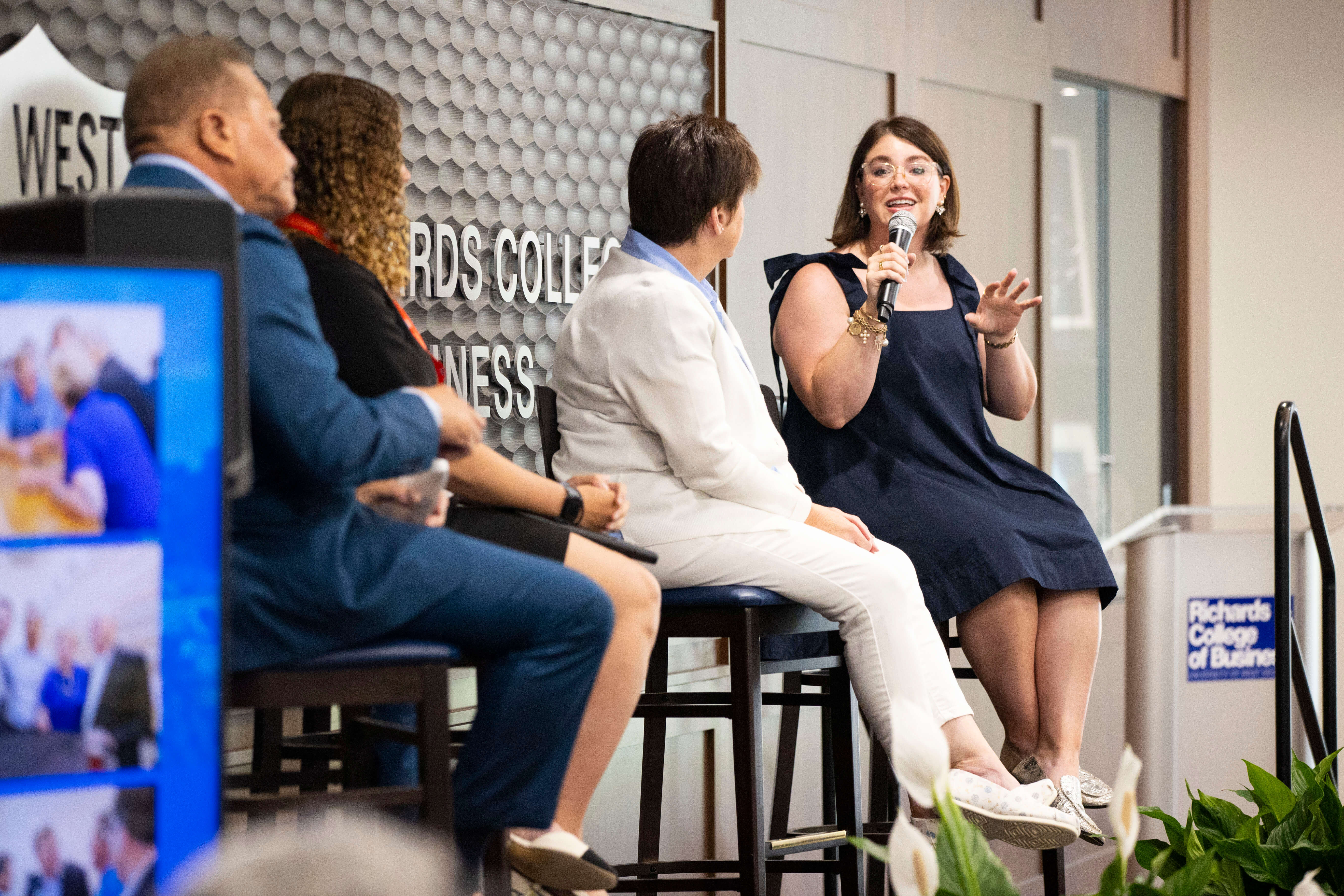 A panel speaks at the Family Business Retreat