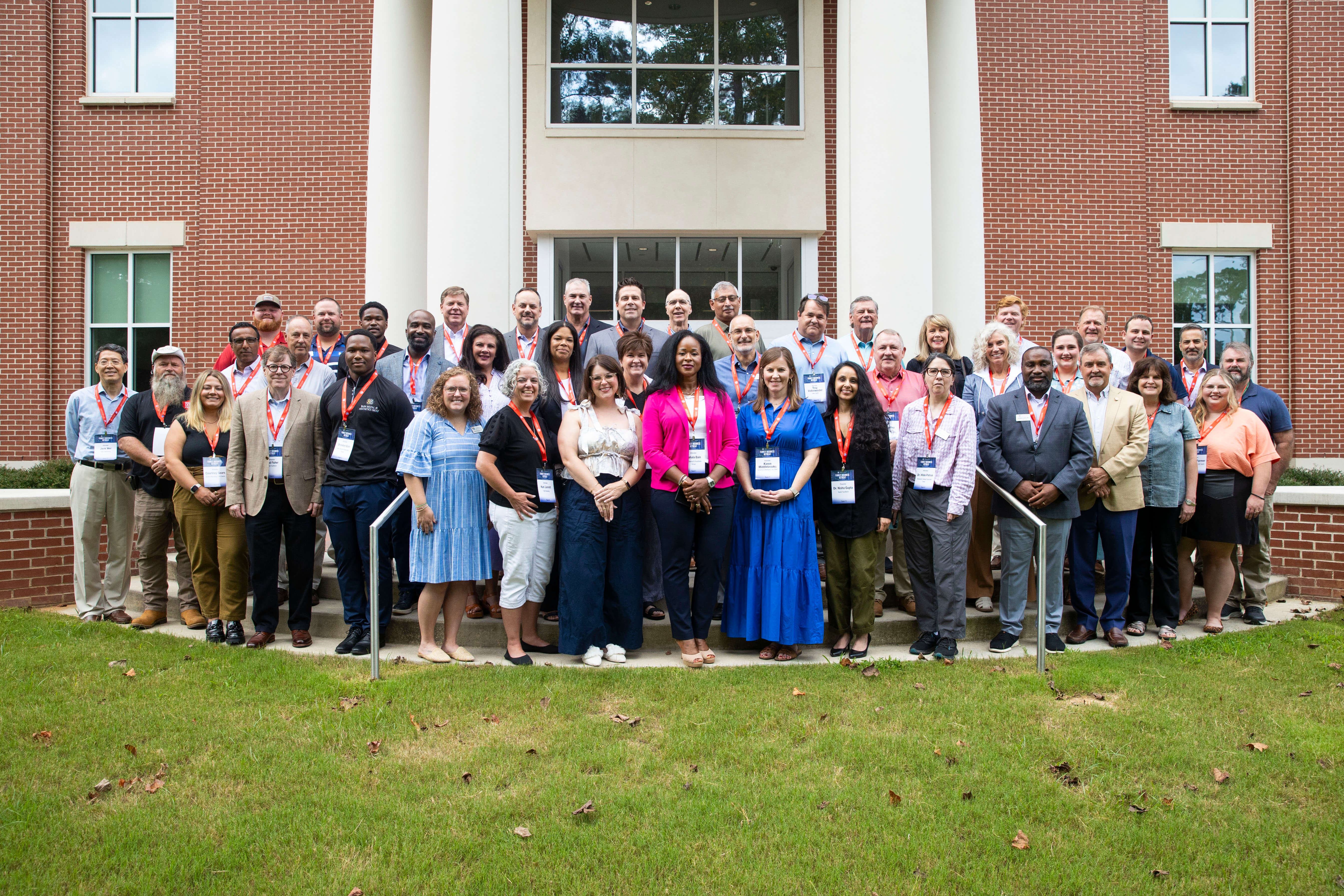 Family Business Retreat attendees pose for a group photo