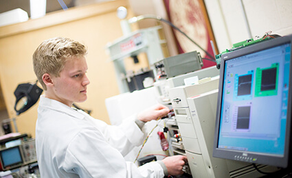 Trevor Banks working in the Physics Lab