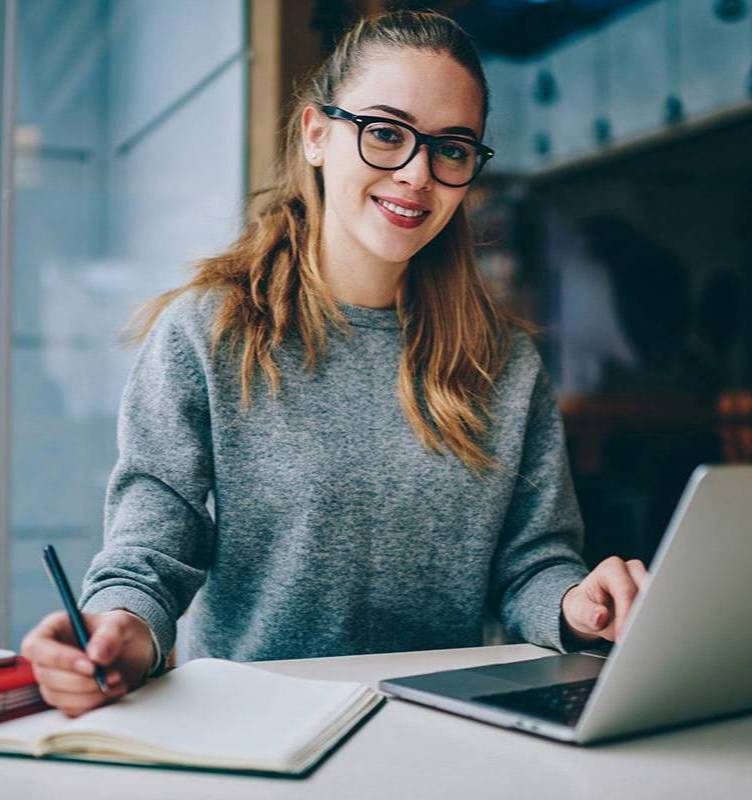 student studying with laptop