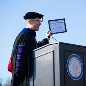 Dr. Kelly speaking at commencement 