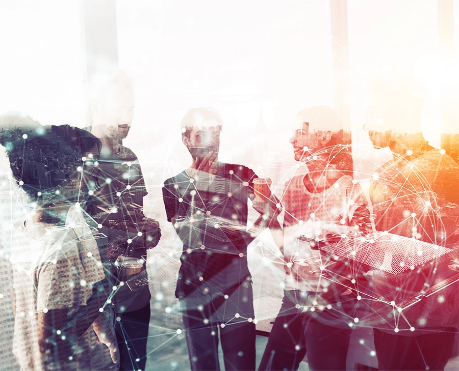 A group of people standing together in discussion, overlaid with an abstract network of connected dots and lines, symbolizing collaboration, research, and academic connection.