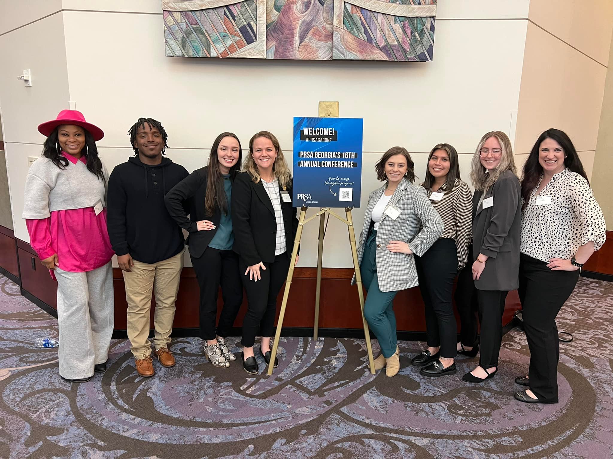 Professors Kelly Williams and Taylor Bryant with public relations students at the 2021 PRSA Conference.