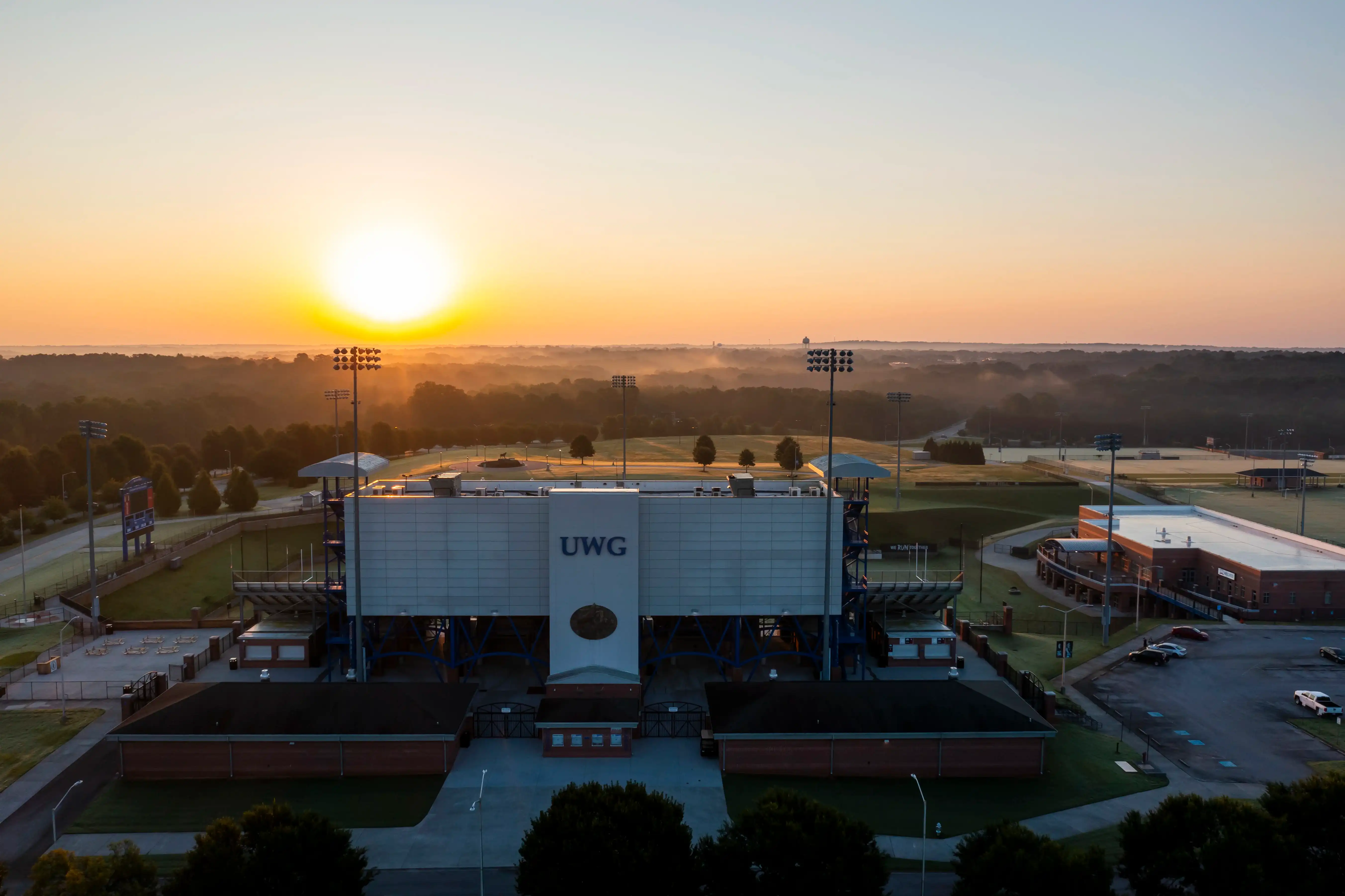 Aeiral photo of the University Stadium at sunset.