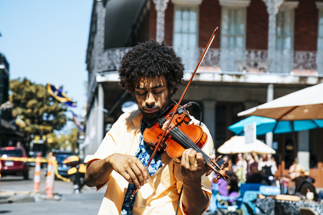An African-American man playing the violin