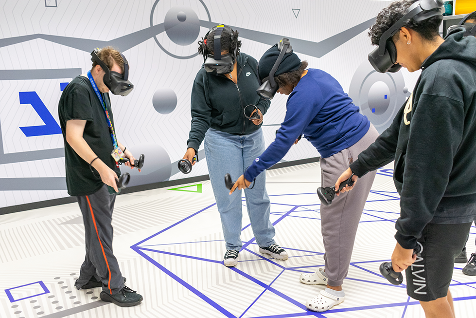 Student interacting in the Virtual Reality Arena