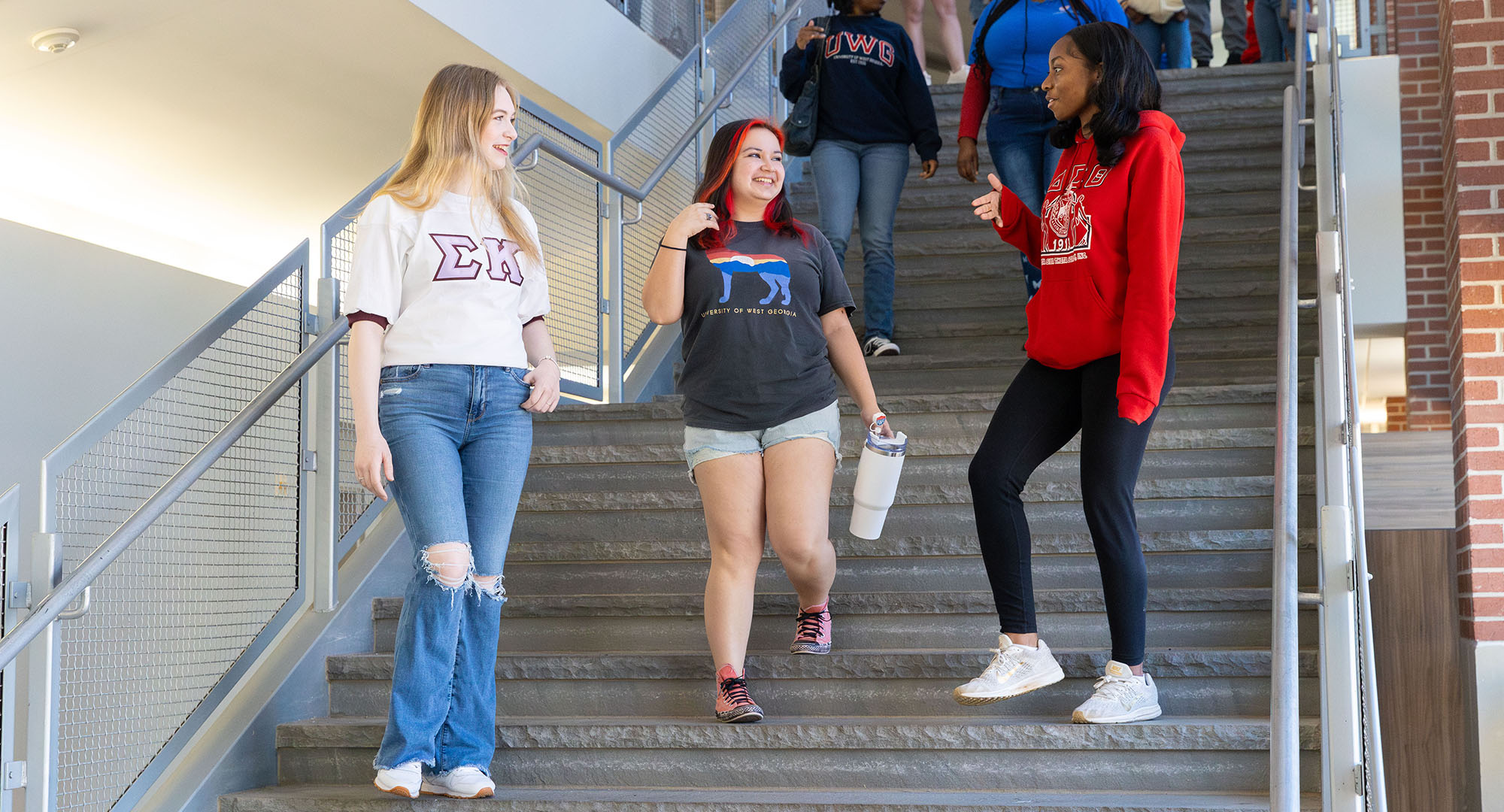 Students walking down stairs