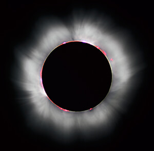 Total solar eclipse depicting corona. 