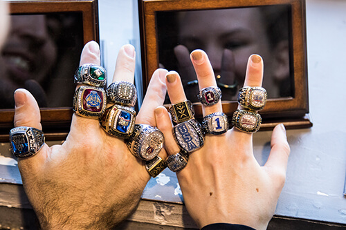 Jordan and Forsyth display their championship rings.